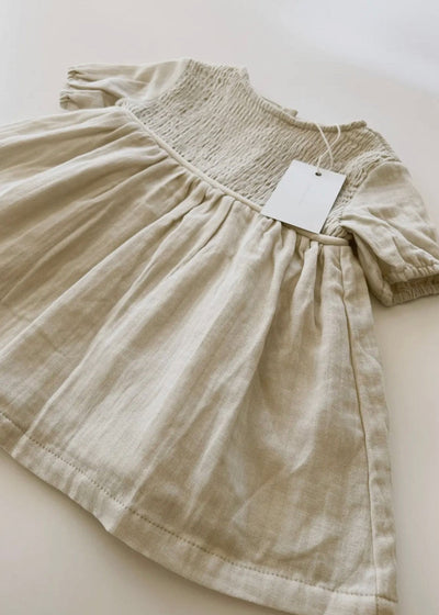 Beautiful Vienna Dress in a natural color, perfect for any occasion